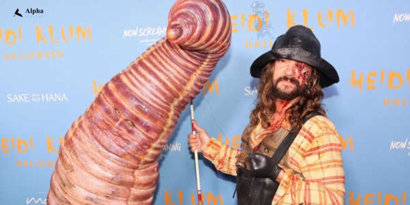 Heidi Klum Returns to Halloween Party with Giant Worm Costume
